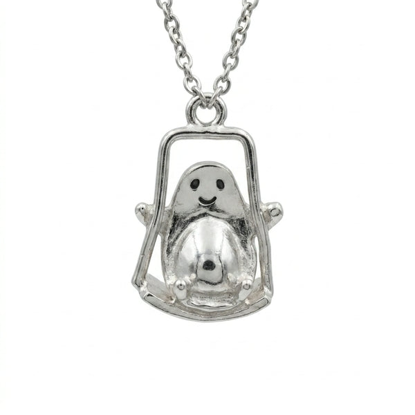Sara Grace Jewelry - Foto Prodotto Ciondolo Avocado Sull'Altalena Su Sfondo Bianco